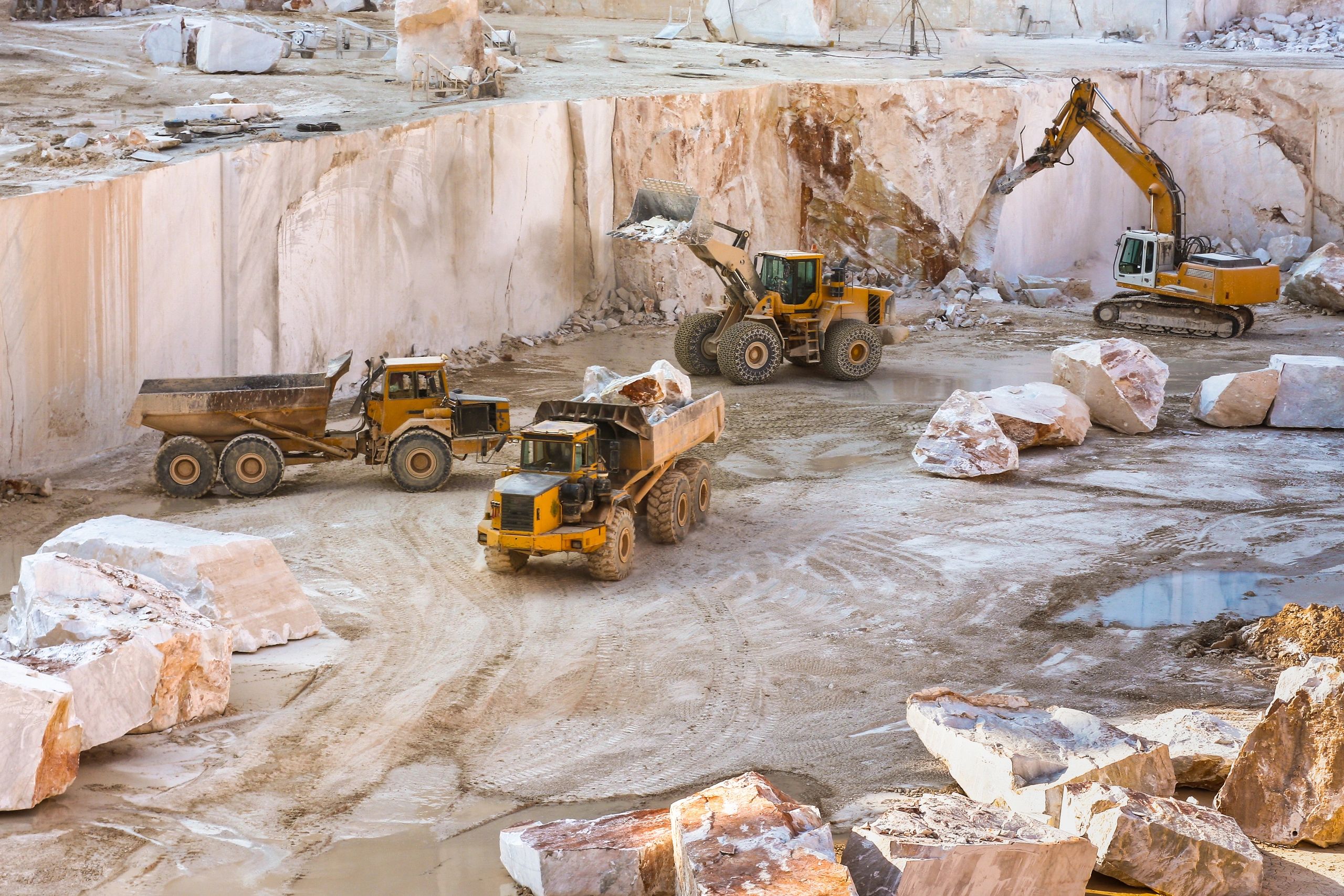Heavy equipment working with stone materials