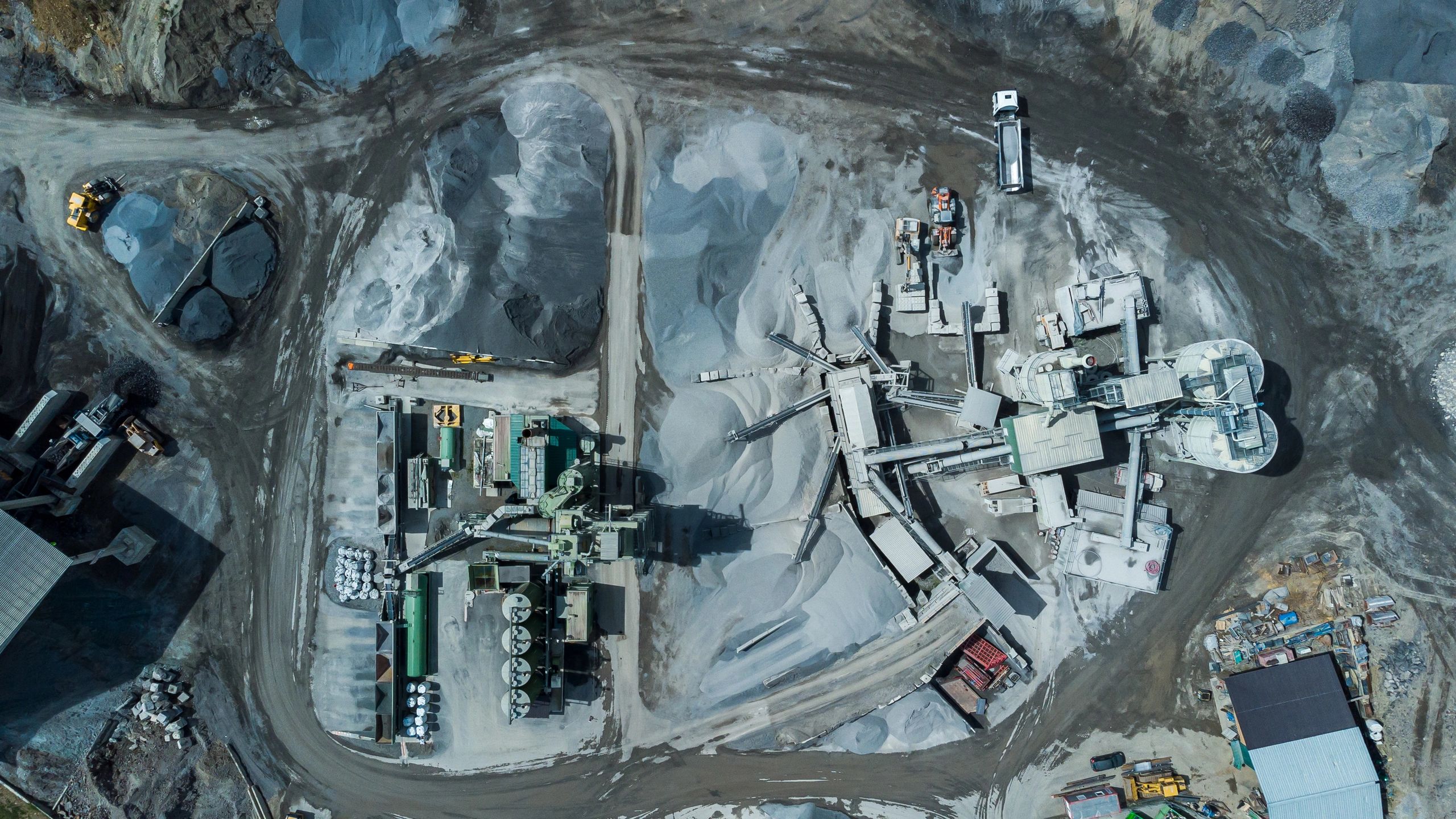 Aerial view of aggregate stockpiles at a materials yard