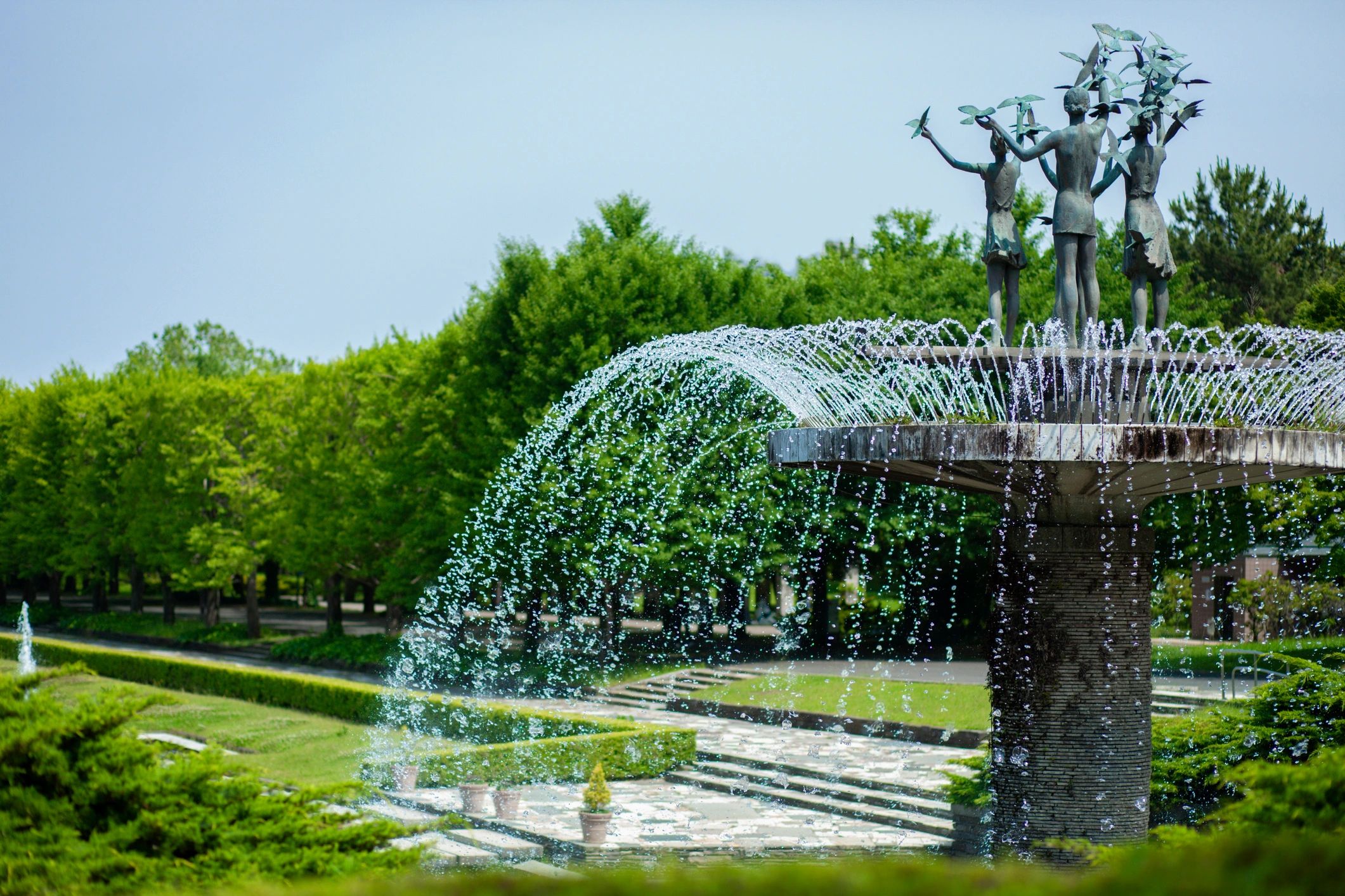 Outdoor garden water feature with a bubbling fountain